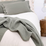 PLED Z WEŁNY Z OZDOBNYM BRZEGIEM OLIWKOWY