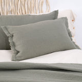 POSZEWKA 60X40 Z WEŁNY Z OZDOBNYM BRZEGIEM OLIWKOWA